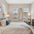bedroom with bed and wall art