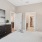 bedroom with bed and wall art