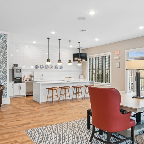Access To Resident Only Amenities lounge style room with lots of seating and a bar area