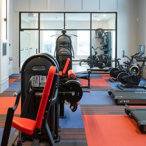 Quick access to state-of-the-art amenities a gym with exercise equipment